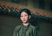 TOP 7 Studio chụp ảnh áo dài cổ phục đẹp ở Huế một cô gái mặc áo tấc màu xanh rêu