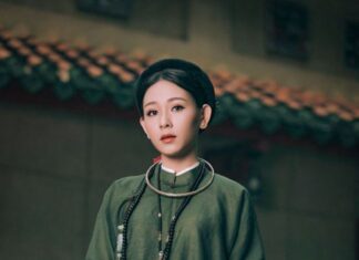 TOP 7 Studio chụp ảnh áo dài cổ phục đẹp ở Huế một cô gái mặc áo tấc màu xanh rêu